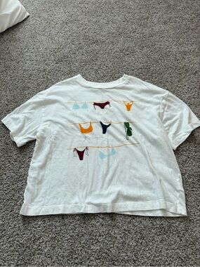 White Graphic Tee with Colorful Swimsuit Print